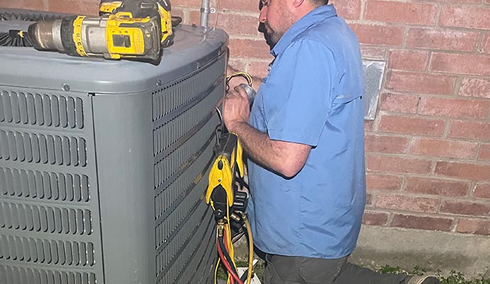 Expert repairing AC using equipment