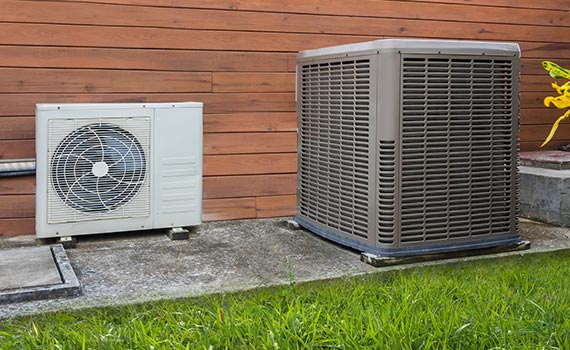 a clean heat pump outside the house