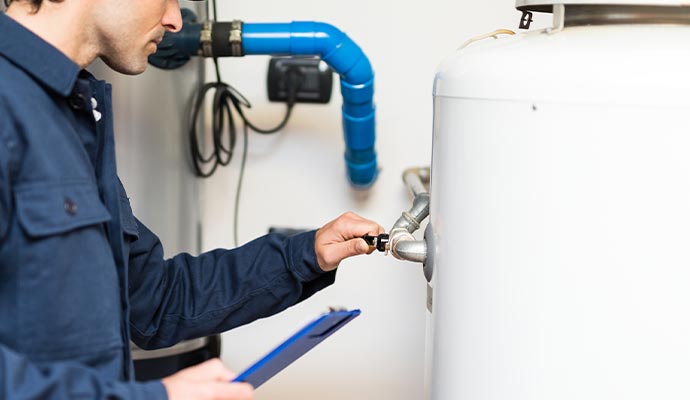 Expert inspecting boiler system